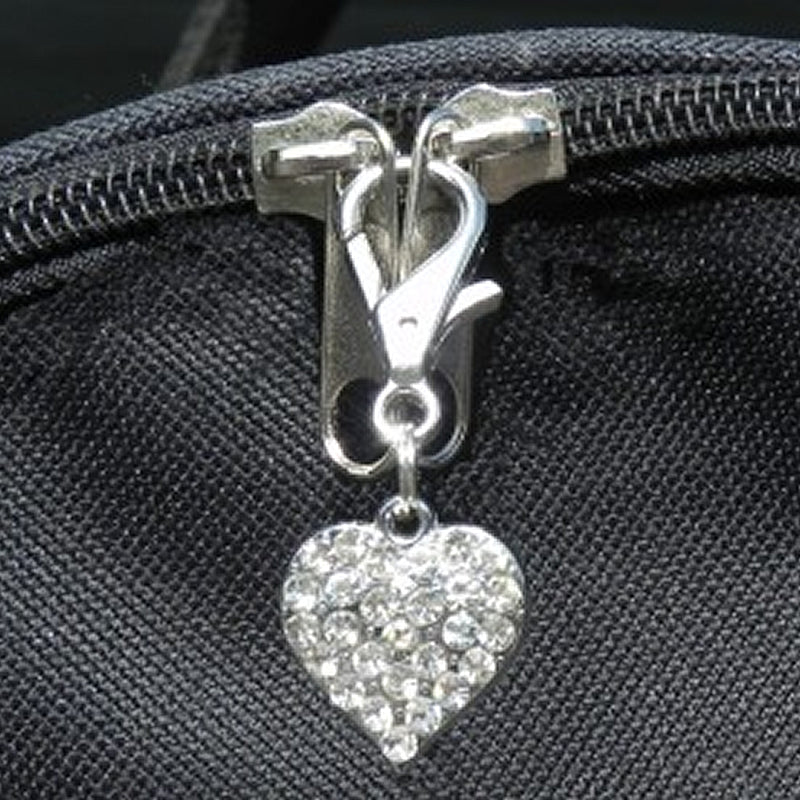 Pet carrier safety locks keep your pet from wriggling out of its carrier.