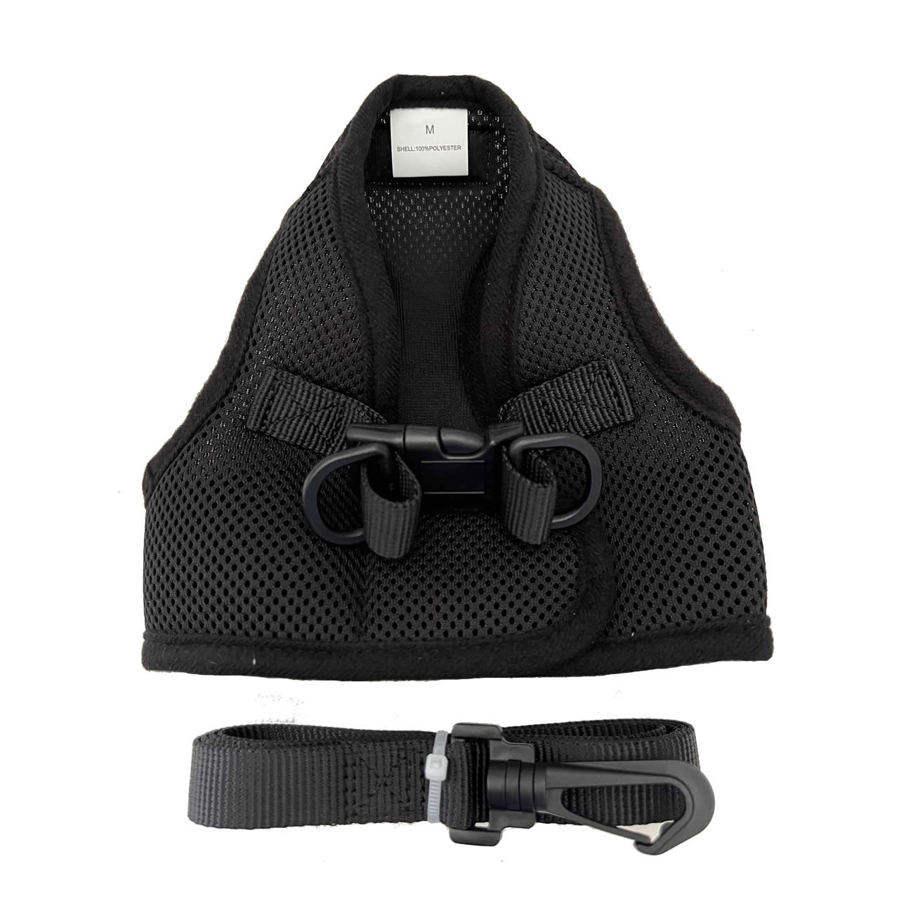 Non-metallic black dog harness with a strap on a white background